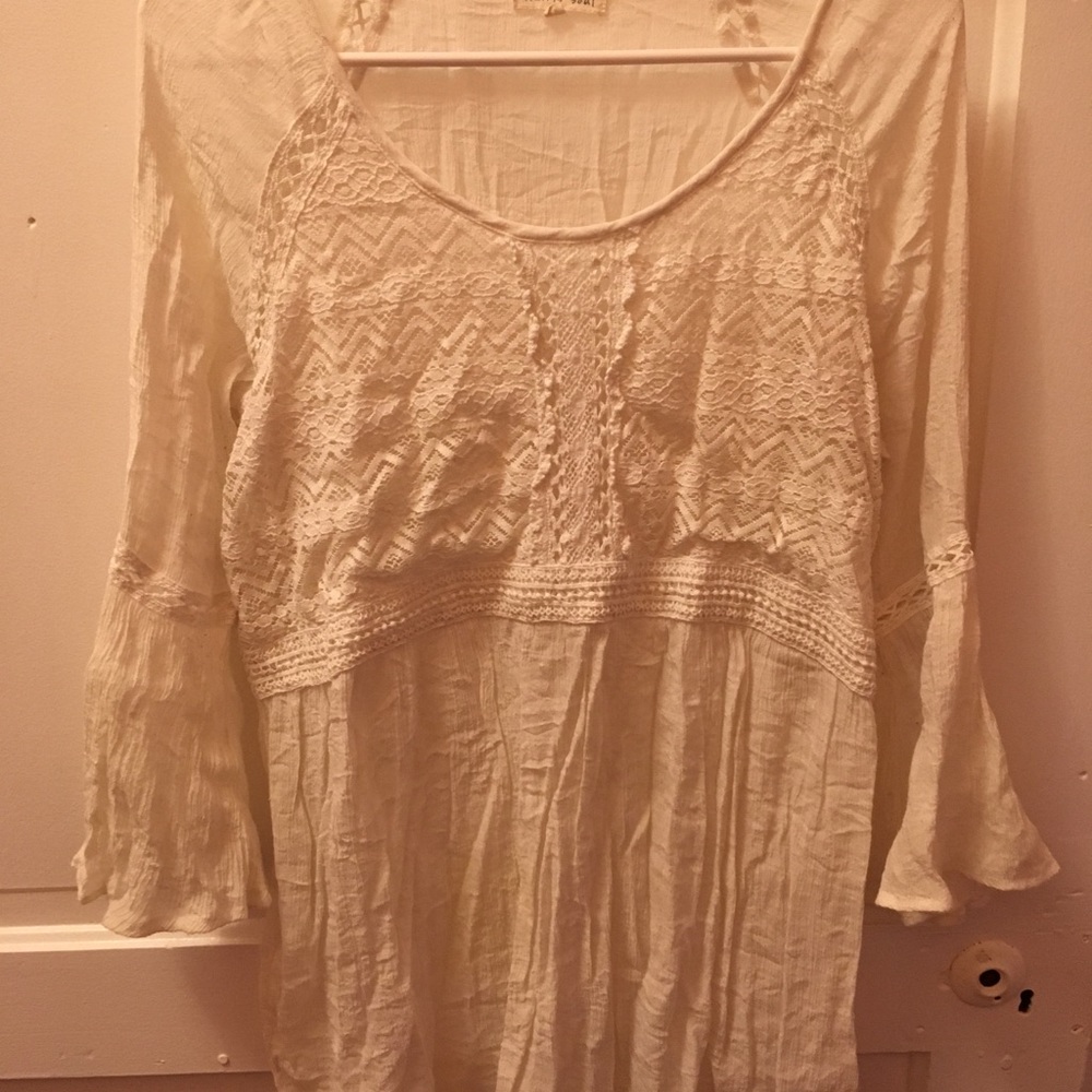 Cream long sleeve shirt